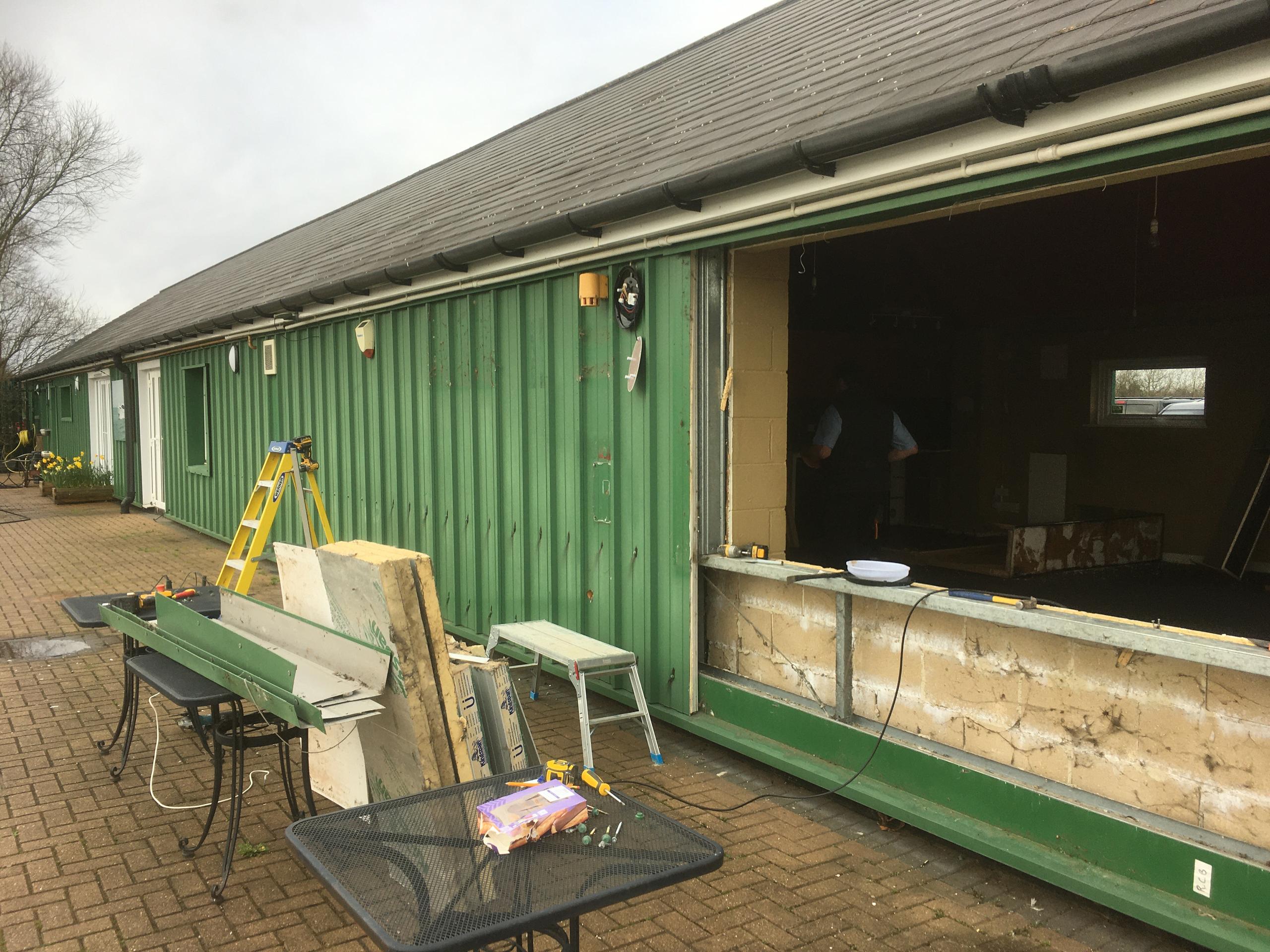 Removal of the external cladding prior to wall removal