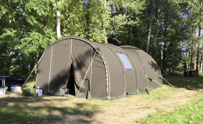 Costomised Karsten Inflatable Bivvy by river bank