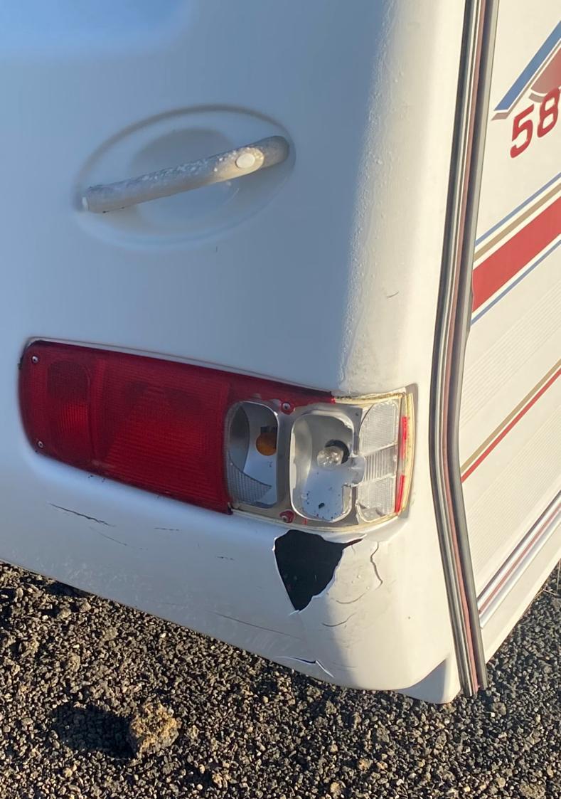 Damaged bumper on rear of motorhome