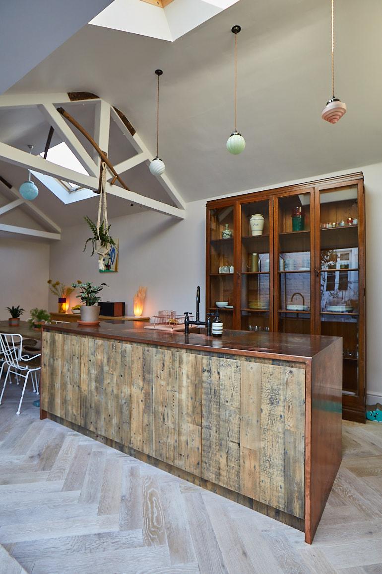 Kitchen with oak floor and exposed beams