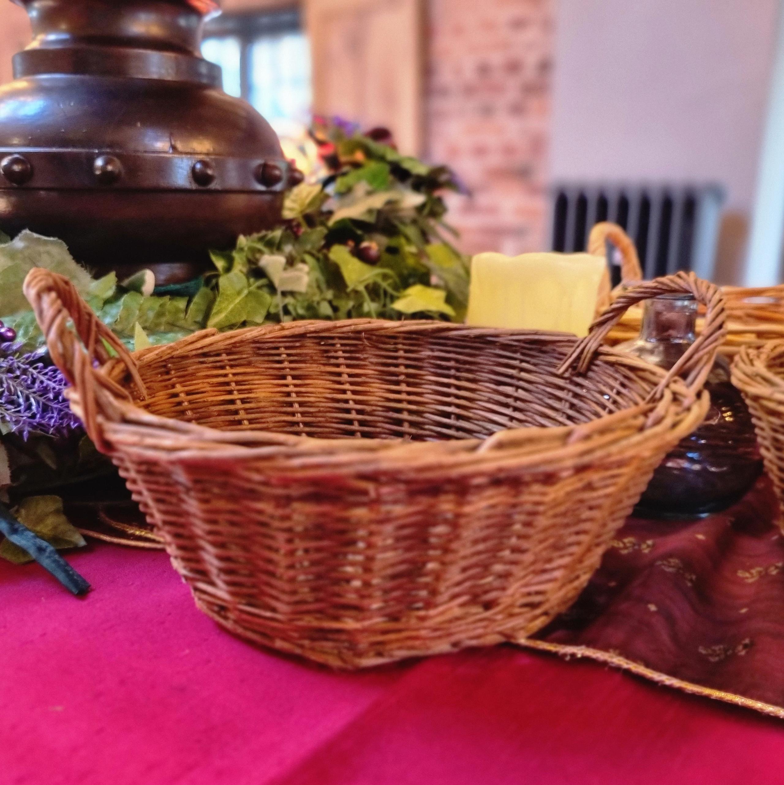 Small Baskets on burgundy table linen
