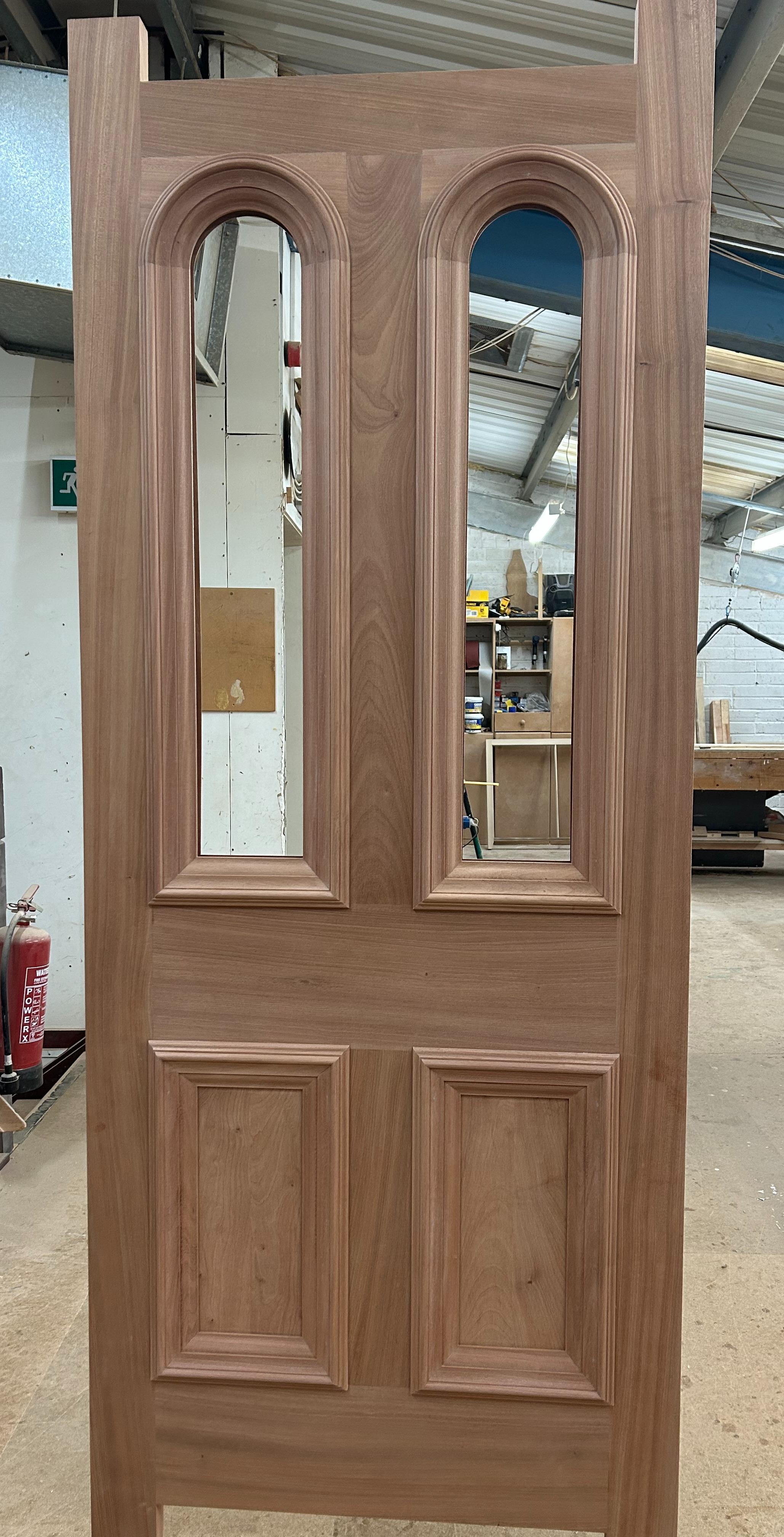 This sapele door had to be an exact replica of the old one - curve work on our CNC machine is easy