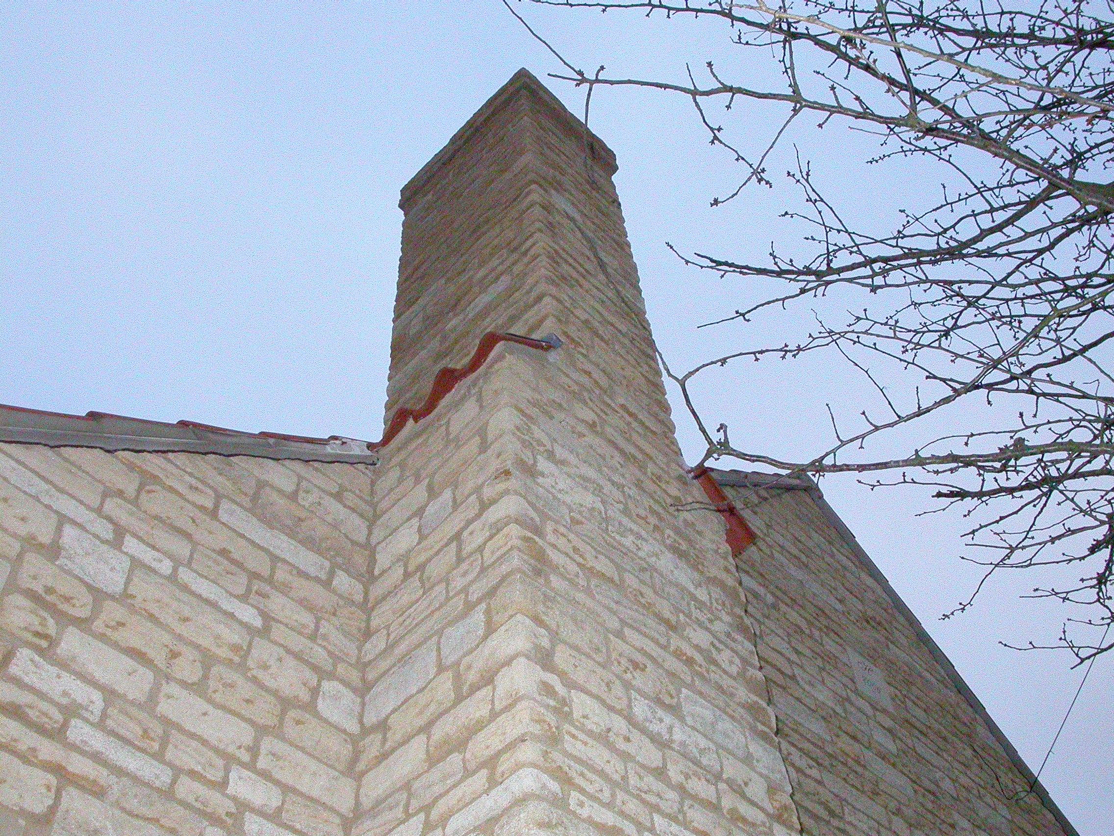 Expert stonemason, working with limestone and ironstone, creating