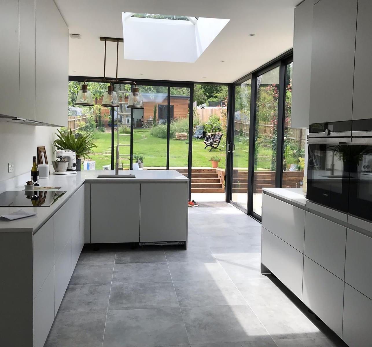 Home extension , beautiful modern kitchen , stairs to garden ,