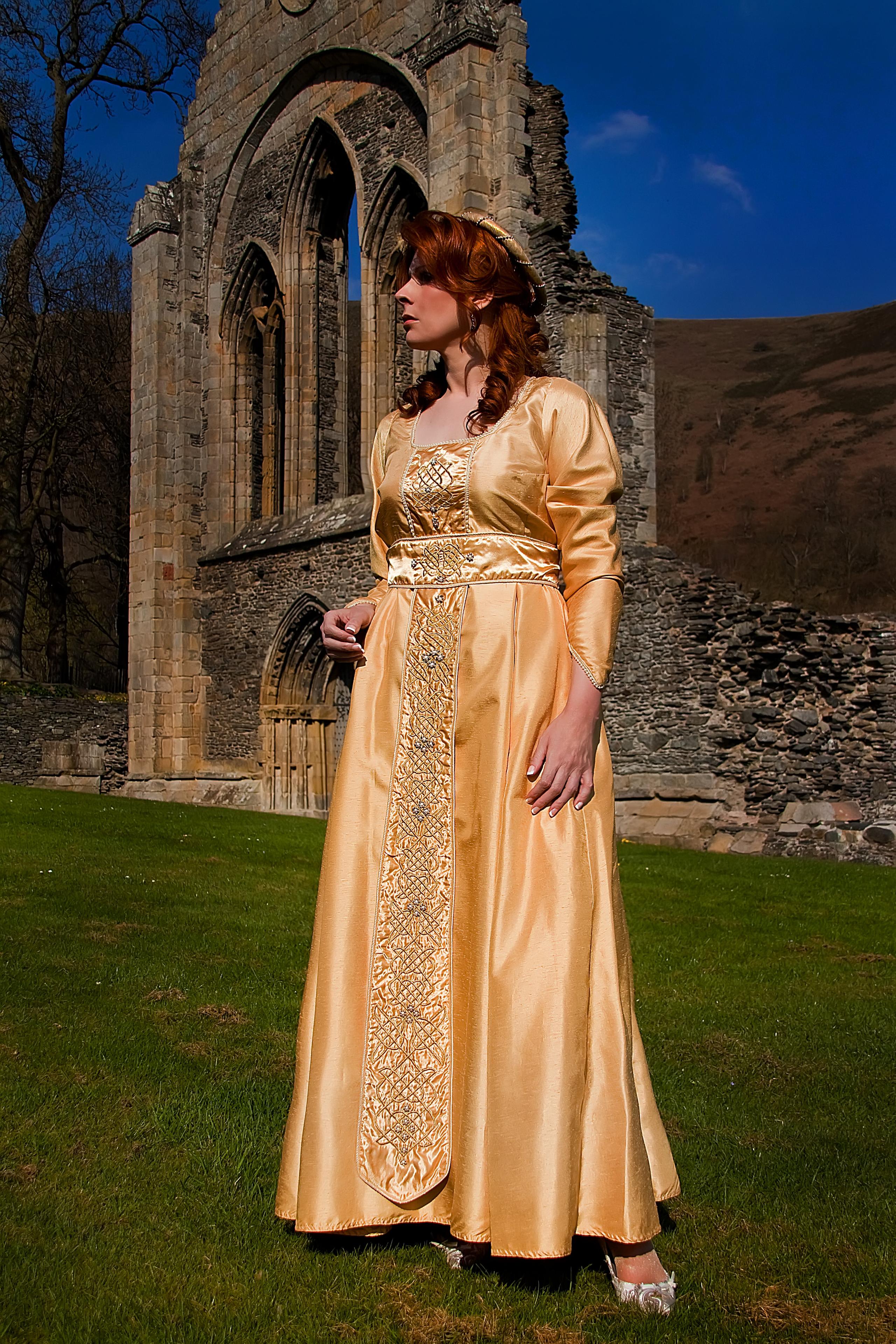 Gold empire line medieval gown with beadwork and celtic knotwork