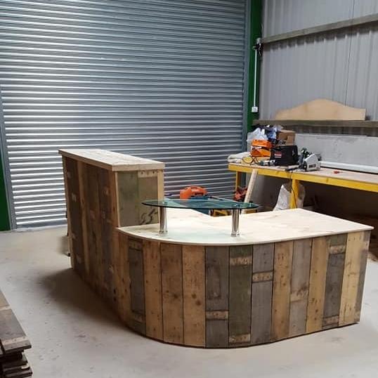 Reception desk - with rustic panel finish.