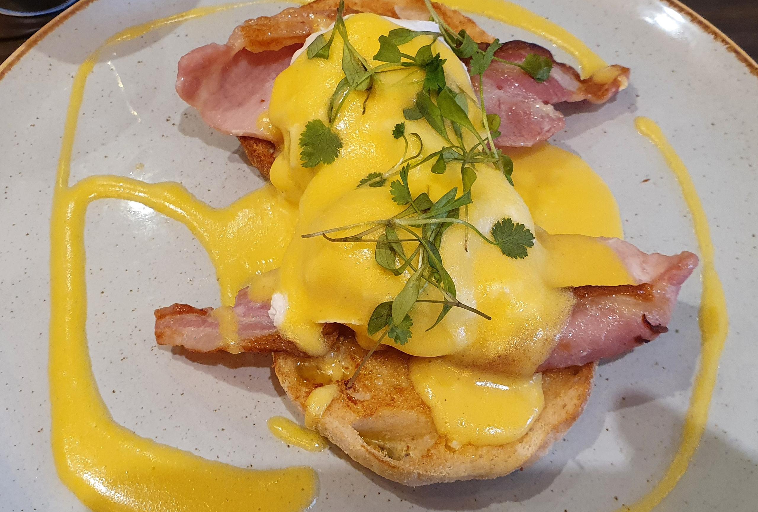 Hollandaise Sauce on a Poached Egg & Bacon Muffin