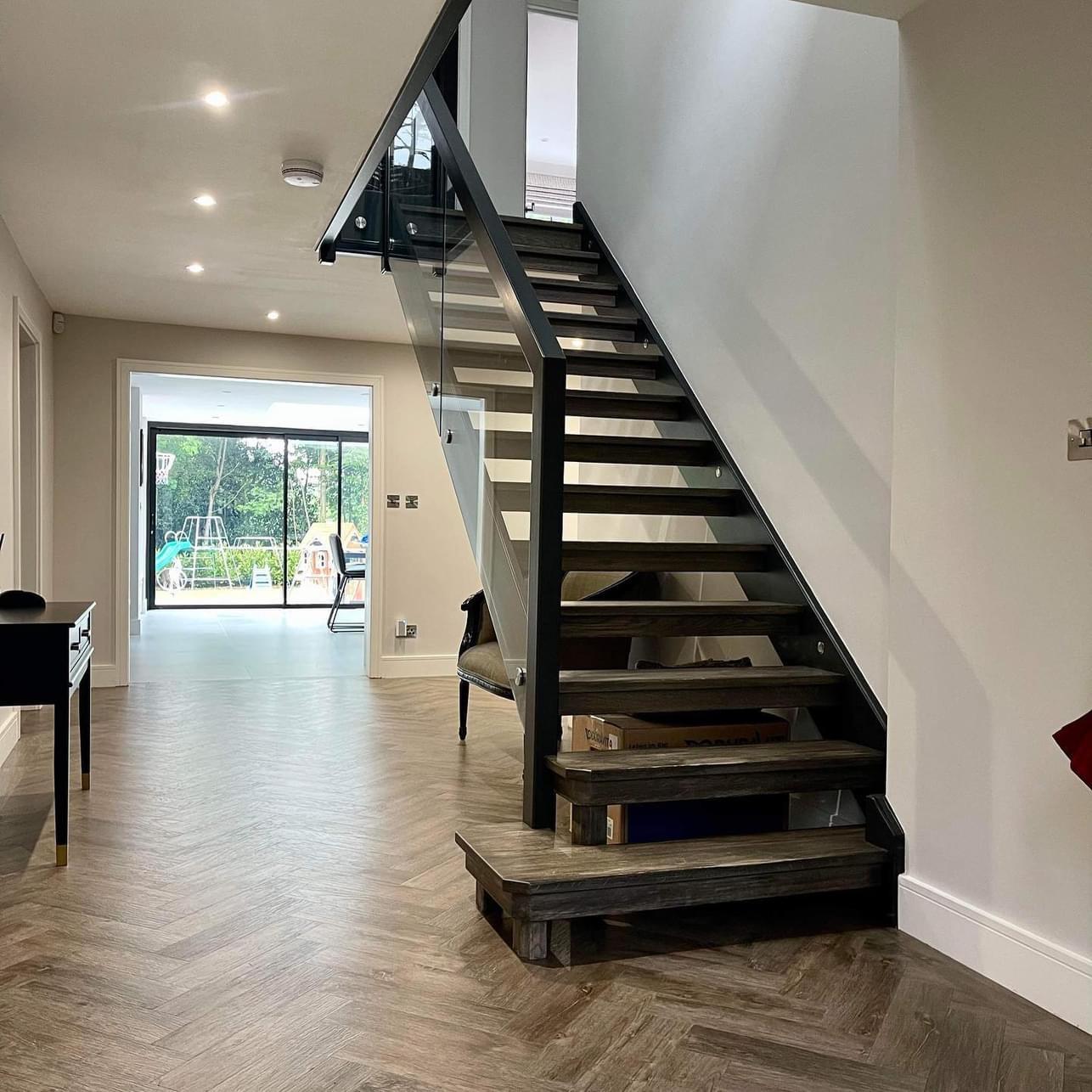 Combination of wood metal and glass for modern stairs