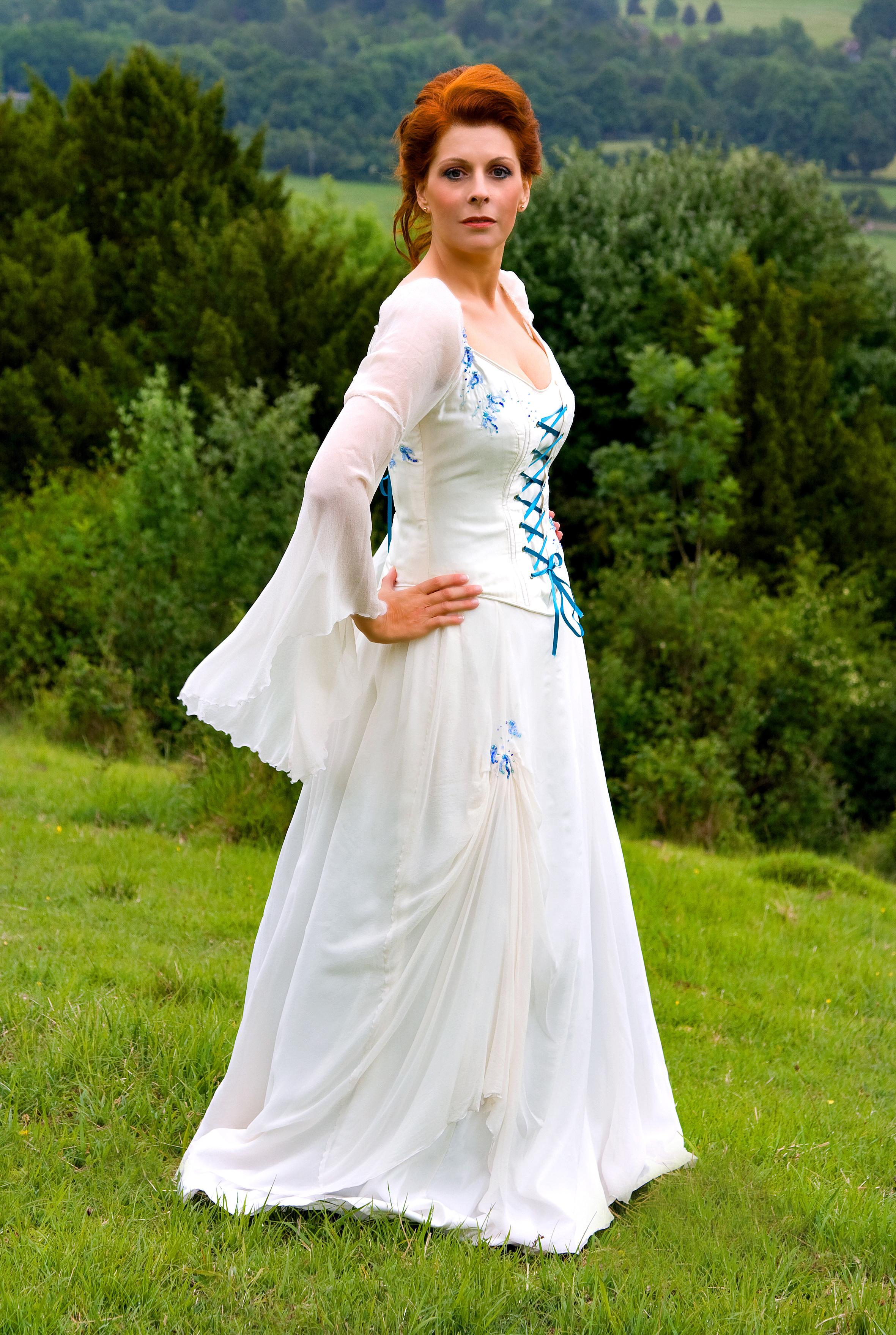 Medieval gown with boned bodice, lightweight crepe overlay and fine blue and turquoise glass beads and ribbon