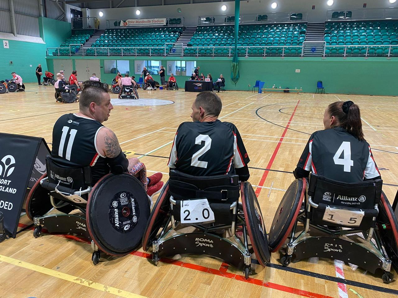 Three players at a Saracens Wheelchair Rugby game