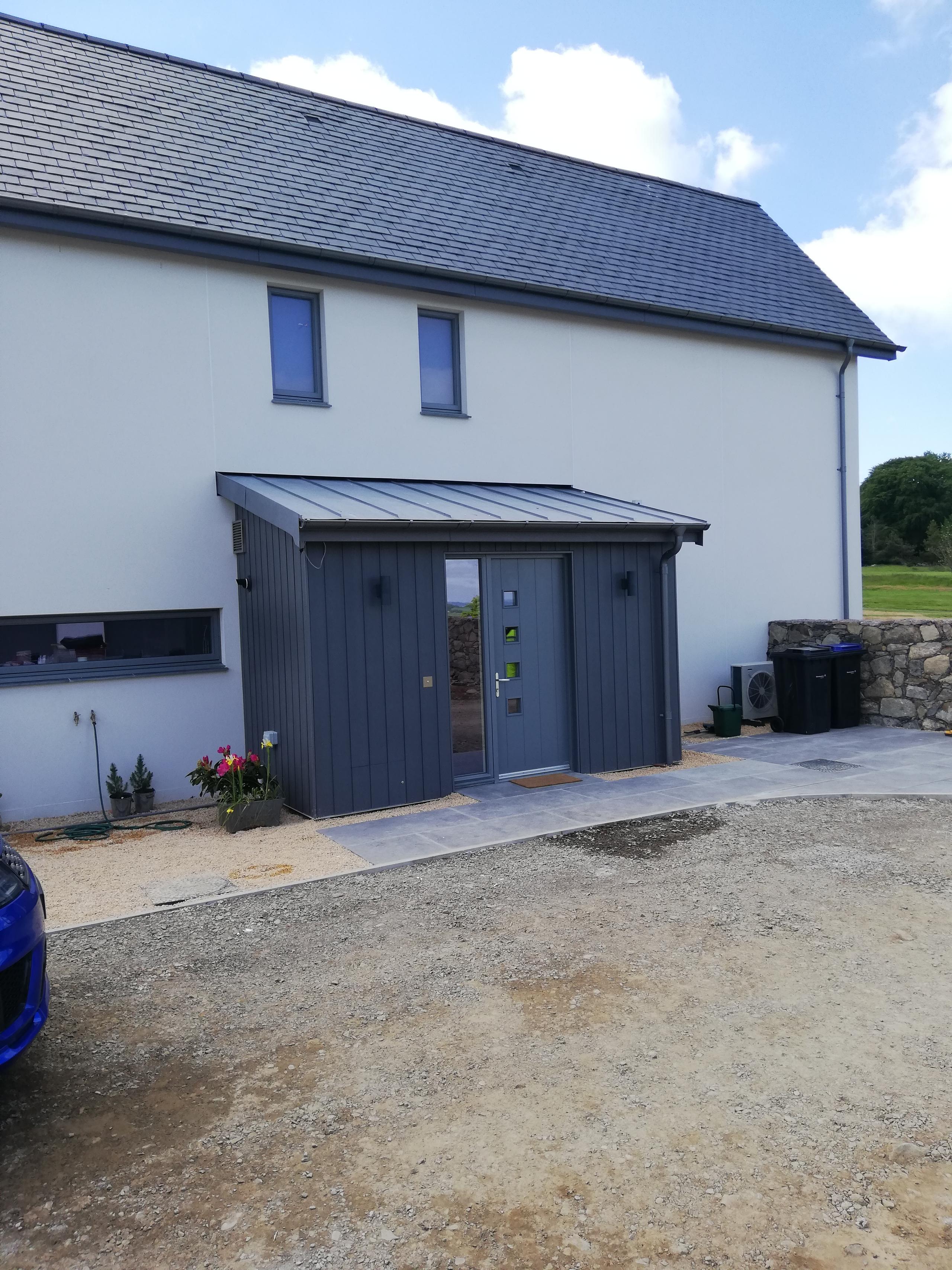 Zinc cladding on vestibule.