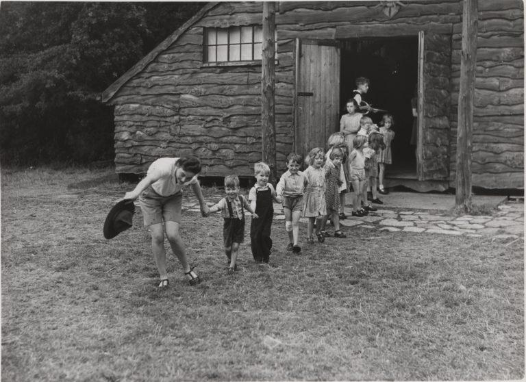 Scout Leader aiding children during WWII