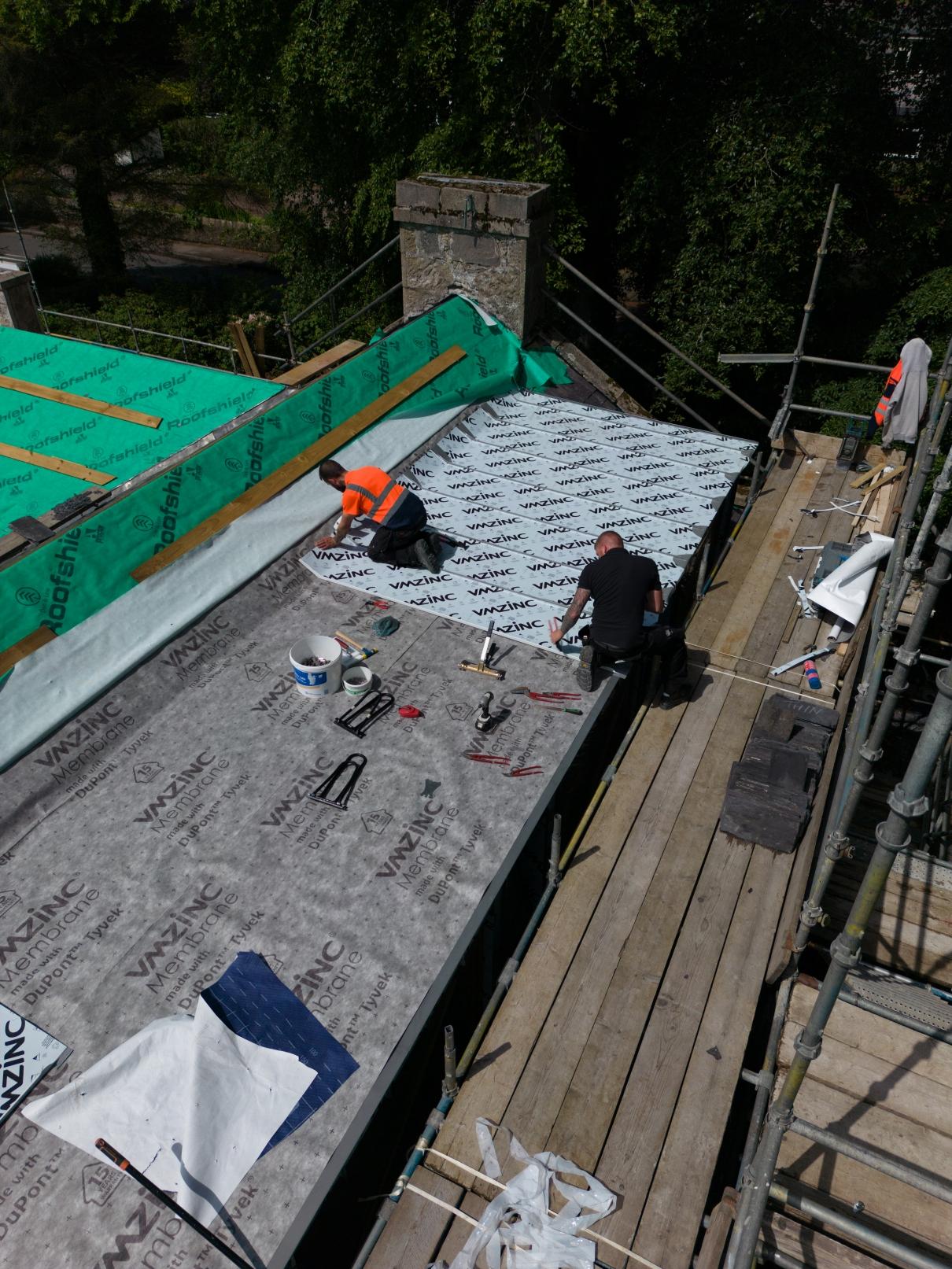 Zinc roof cladding in progress, ariel view.