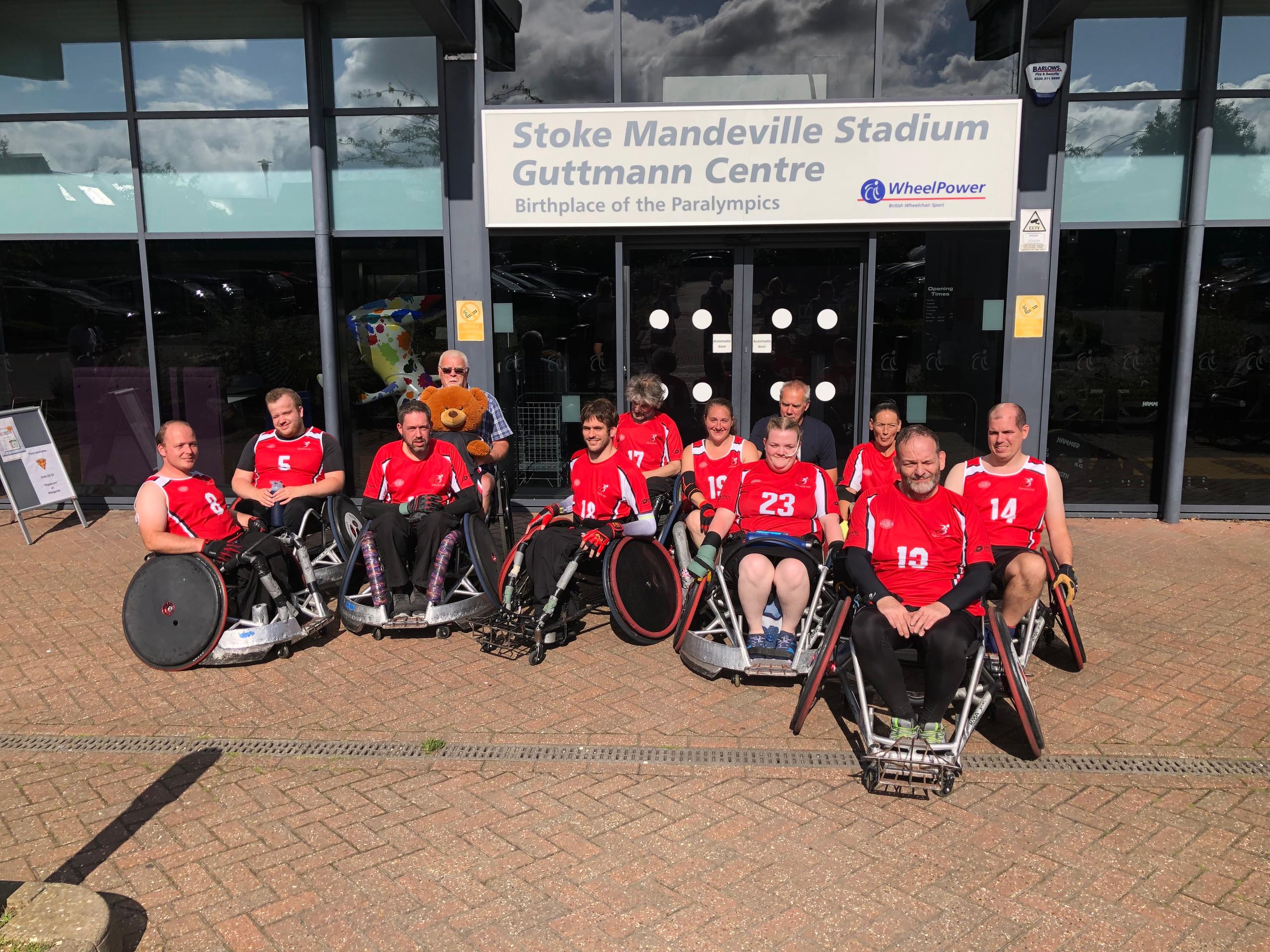 Saracens Wheelchair Rugby Club players at Stoke Mandeville Stadium Guttmann Centre wearing red