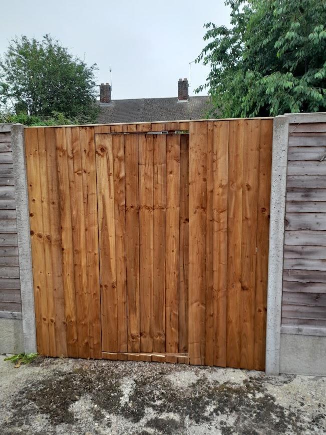 6ft x 6ft closeboard fence panel with a door built in