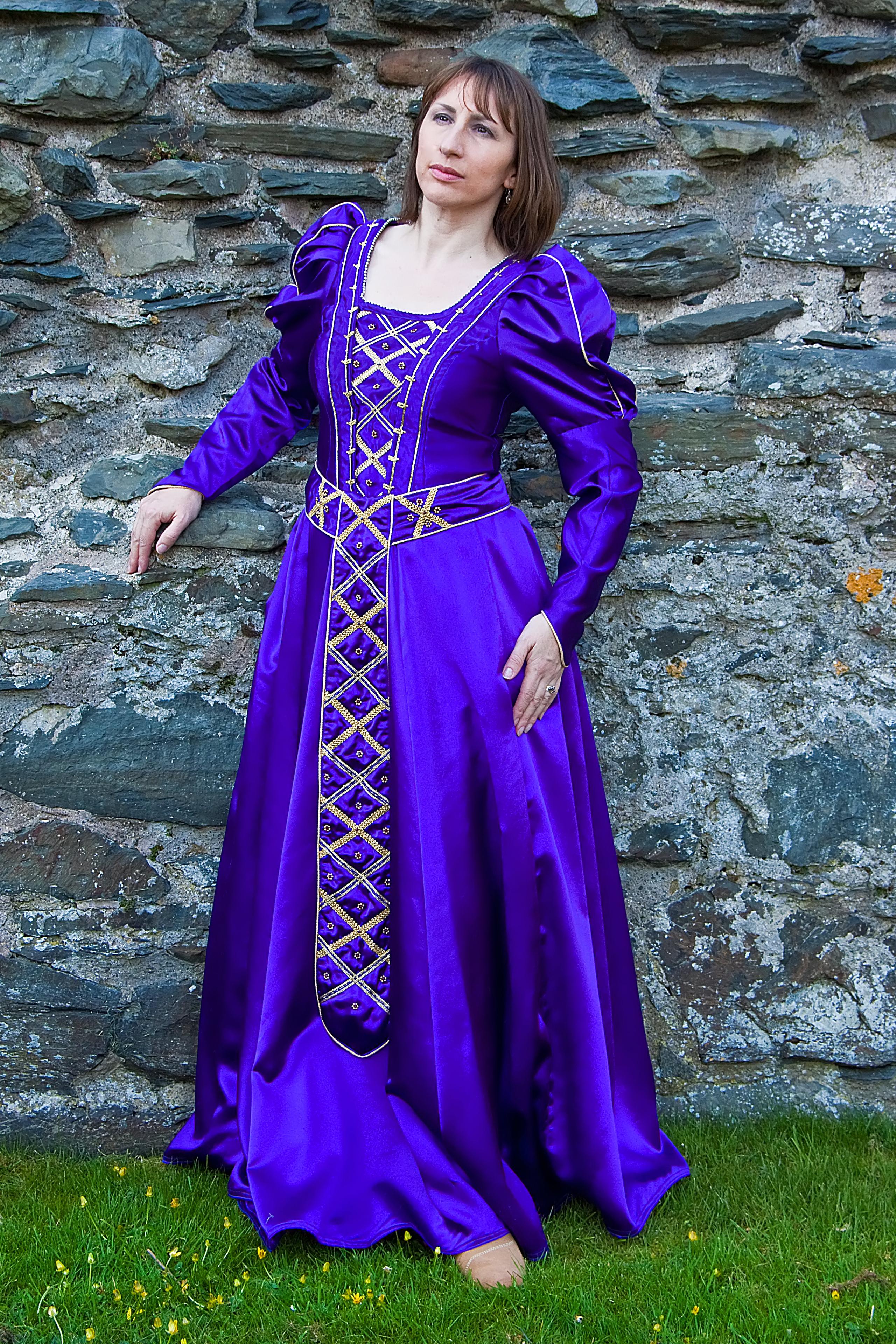 Purple lustre medieval gown with gold trimmings and silver beadwork