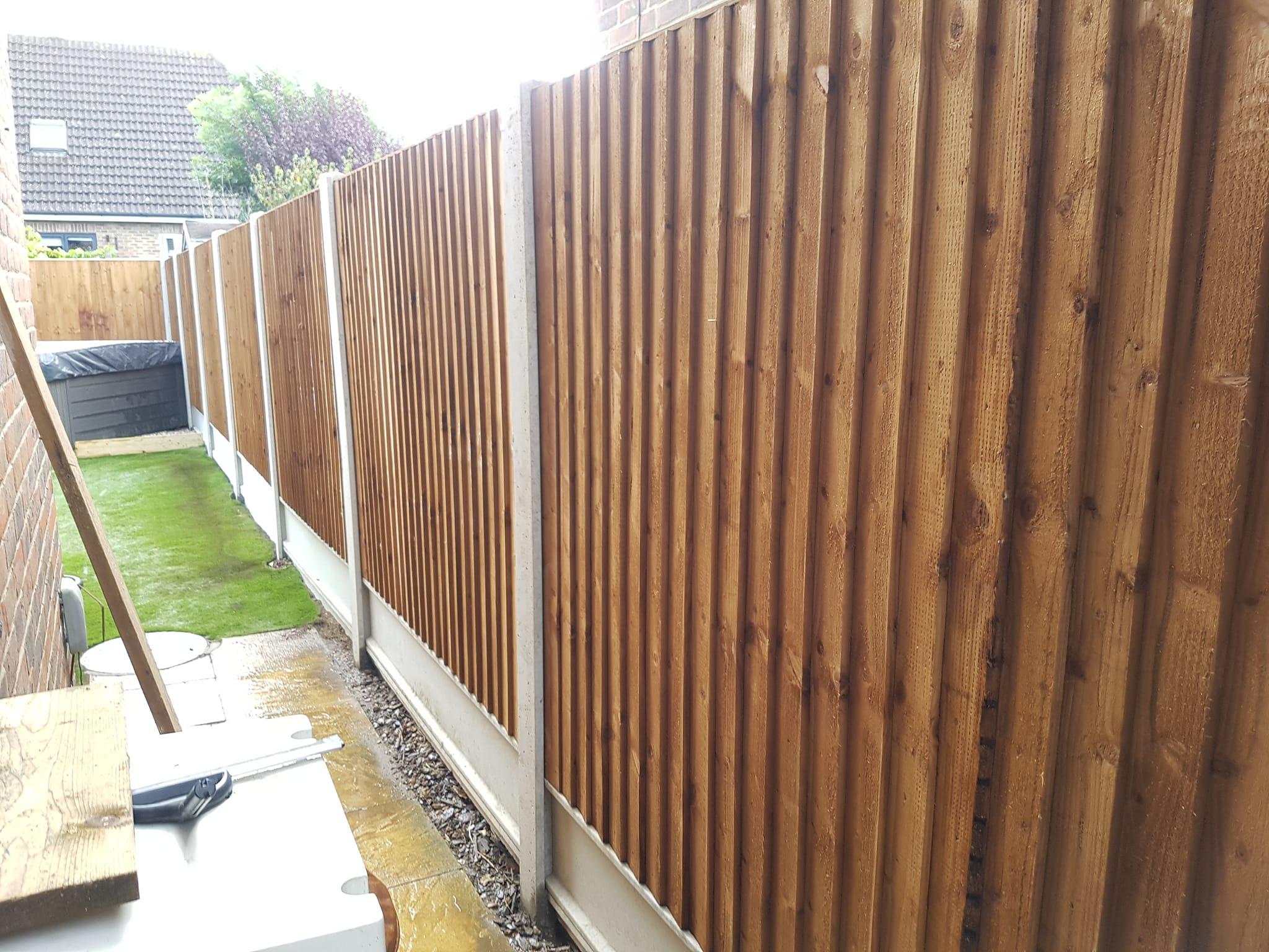 With concrete posts and gravelboard,  Fencing installed in St mary's island