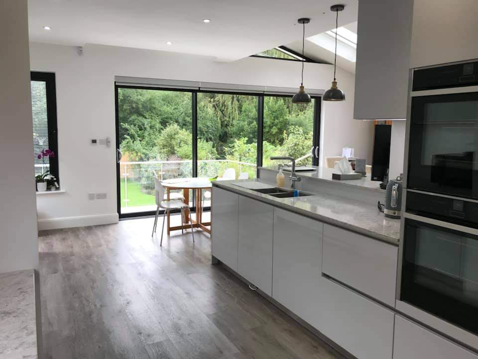 Modern interior renovation , kitchen , extra light added via glass ceiling