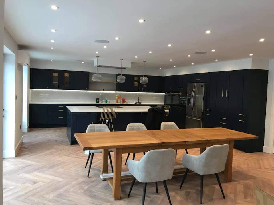 Interior renovation , open plan kitchen dining area , classic wooden flooring