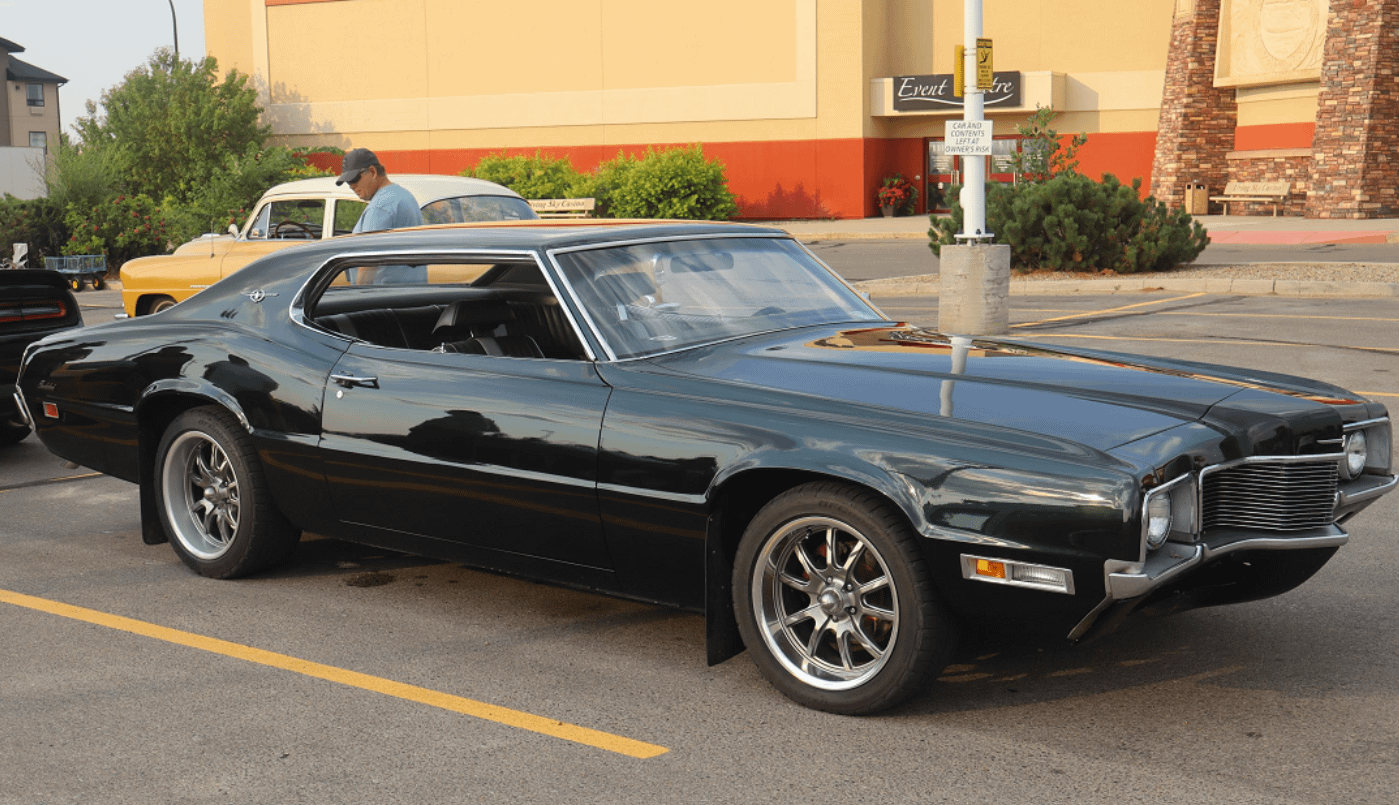 Under the Hood of this dark storm cloud of a 1970 Ford Thunderbird