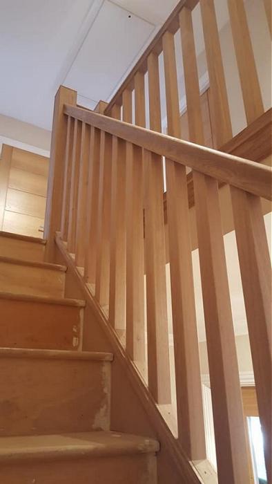 Wooden stair banister.