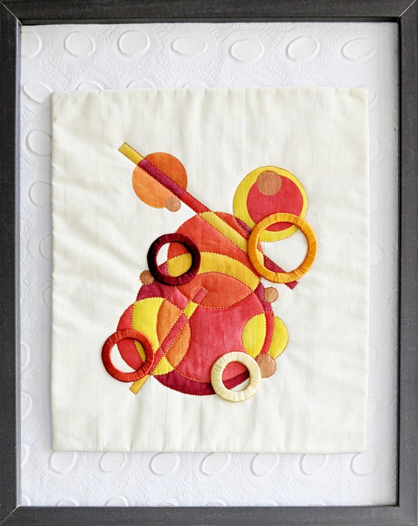 Painted quilt with circles wrapped in silk thread. Mounted onto textured paper. 31 x 38cm