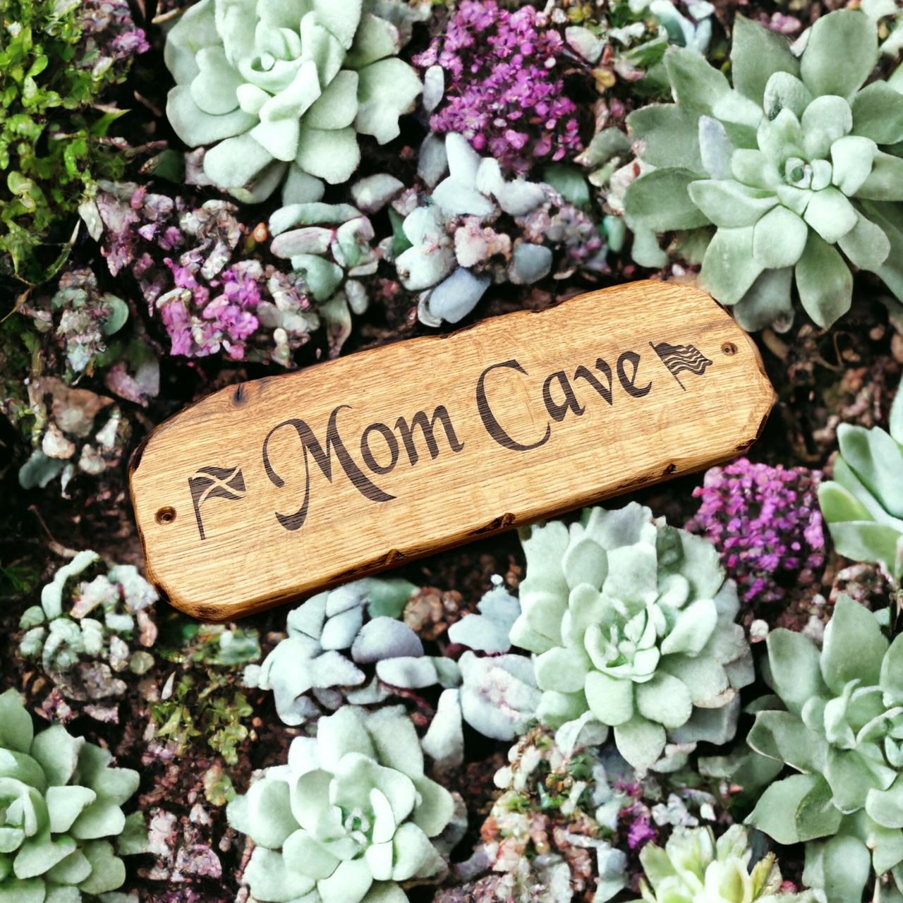 mom cave plaque