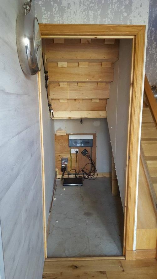 Under stair area, before work commenced.